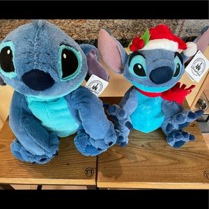 DISNEY PARKS authentic big Stitch and Christmas Stitch plush animals. NWT
